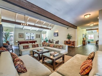 Axiom Tustin Apartments Clubhouse Interior and Sitting Area Axiom Tustin Apartments Clubhouse Interior and Sitting Area